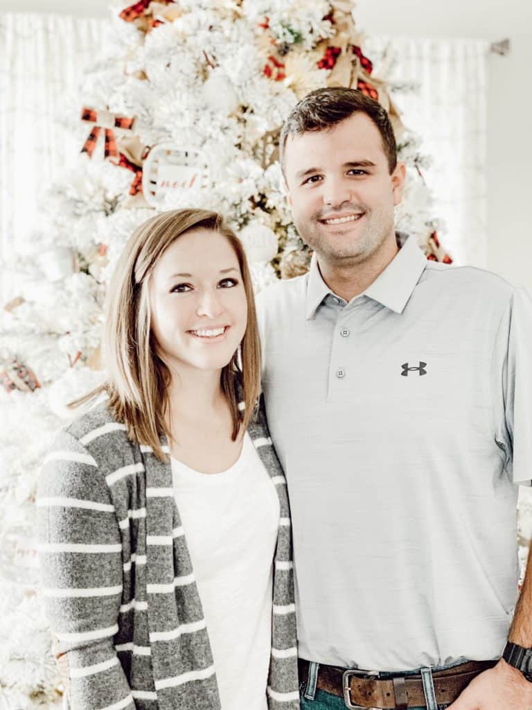 My husband and me by the Christmas Tree