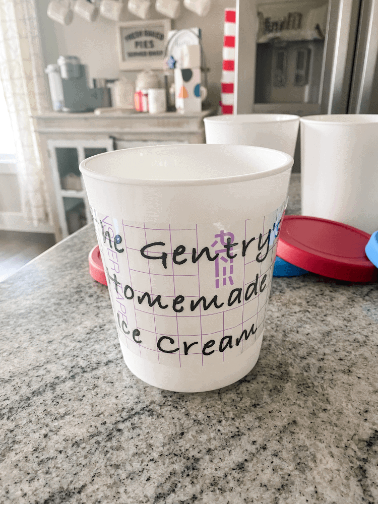 Applying label to ice cream containers 