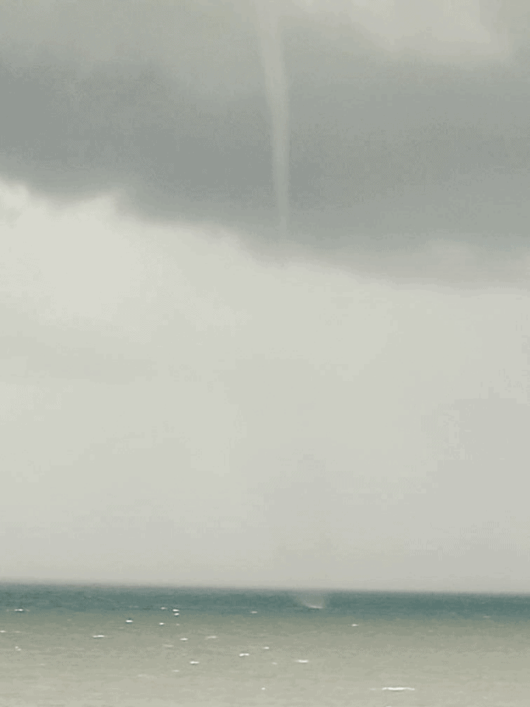 Water Spout on the Beach
