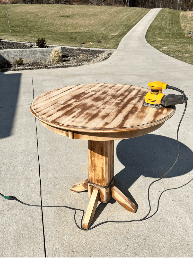 Sanding down the table