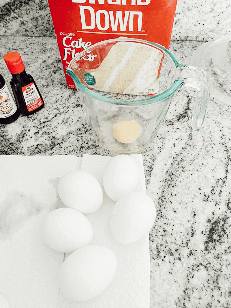 Adding eggs to cake mix