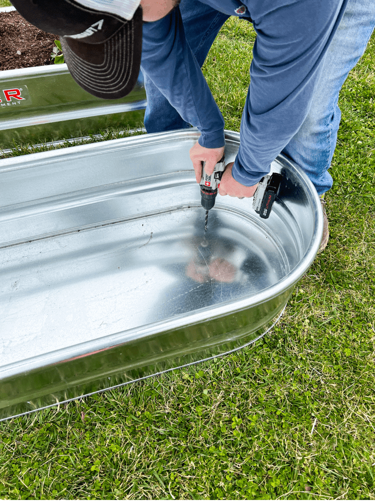 Drilling Holes into Raised Garden Bed