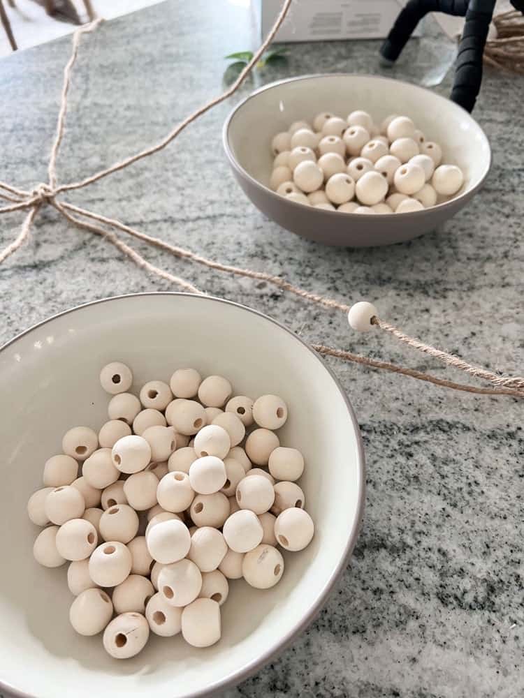 Stringing Wood Beads onto Pumpkin