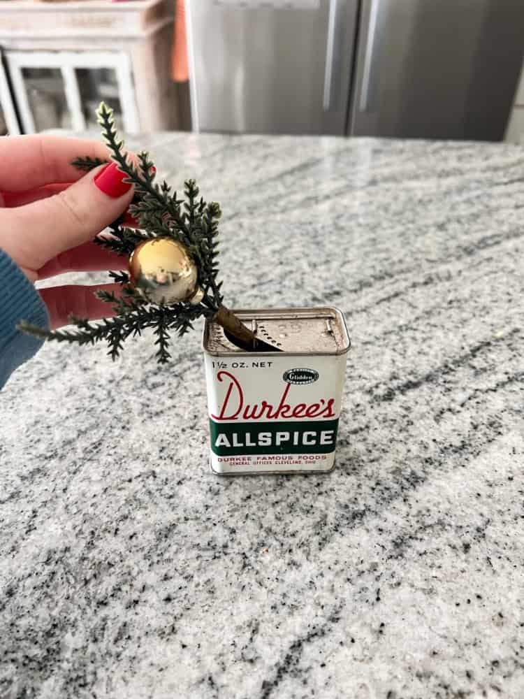 Placing Sprigs in Vintage Spice Tin