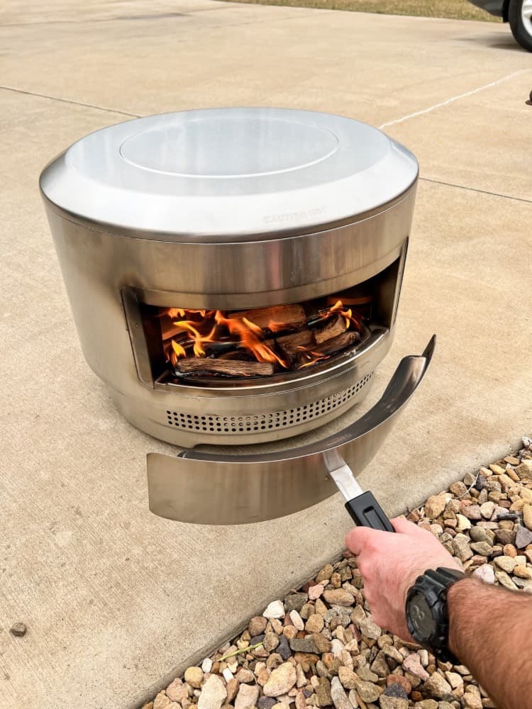 Adding the Wood Chips to the back of the Pi Oven