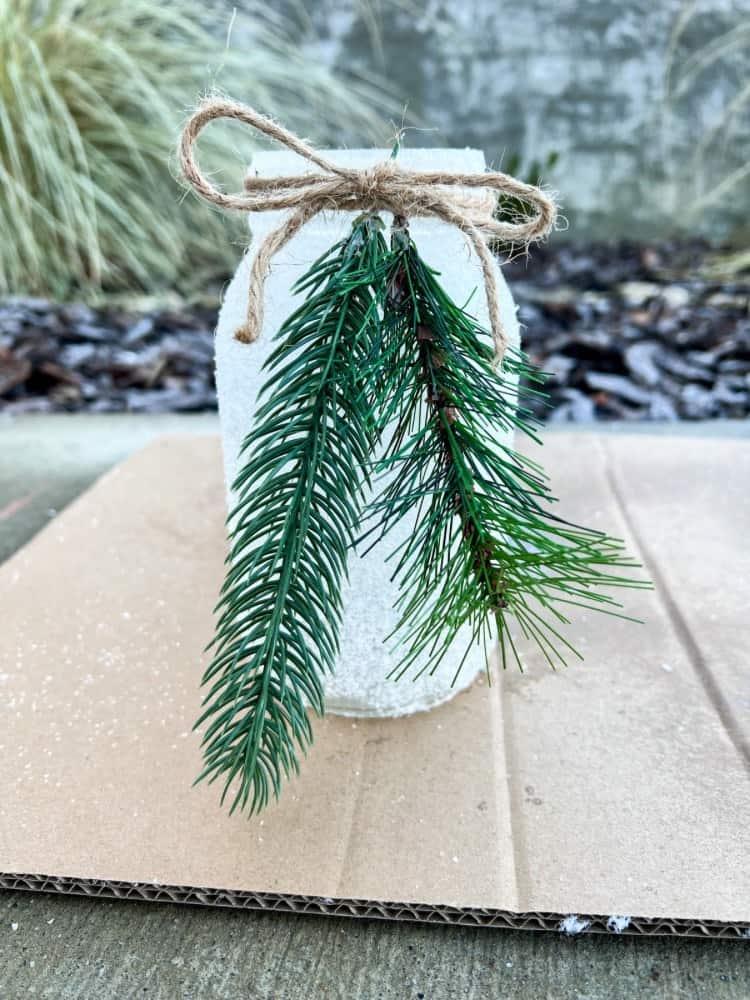 Adding Greenery to Snowy Mason Jars