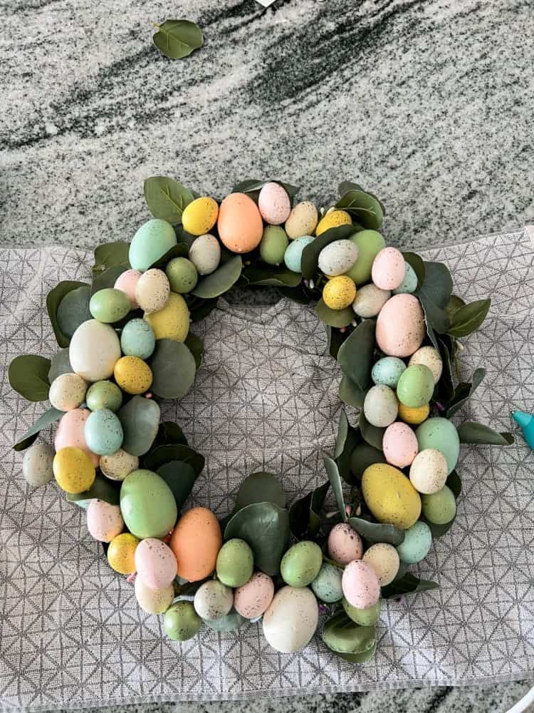Working on Easter Egg Dollar Tree Wreath