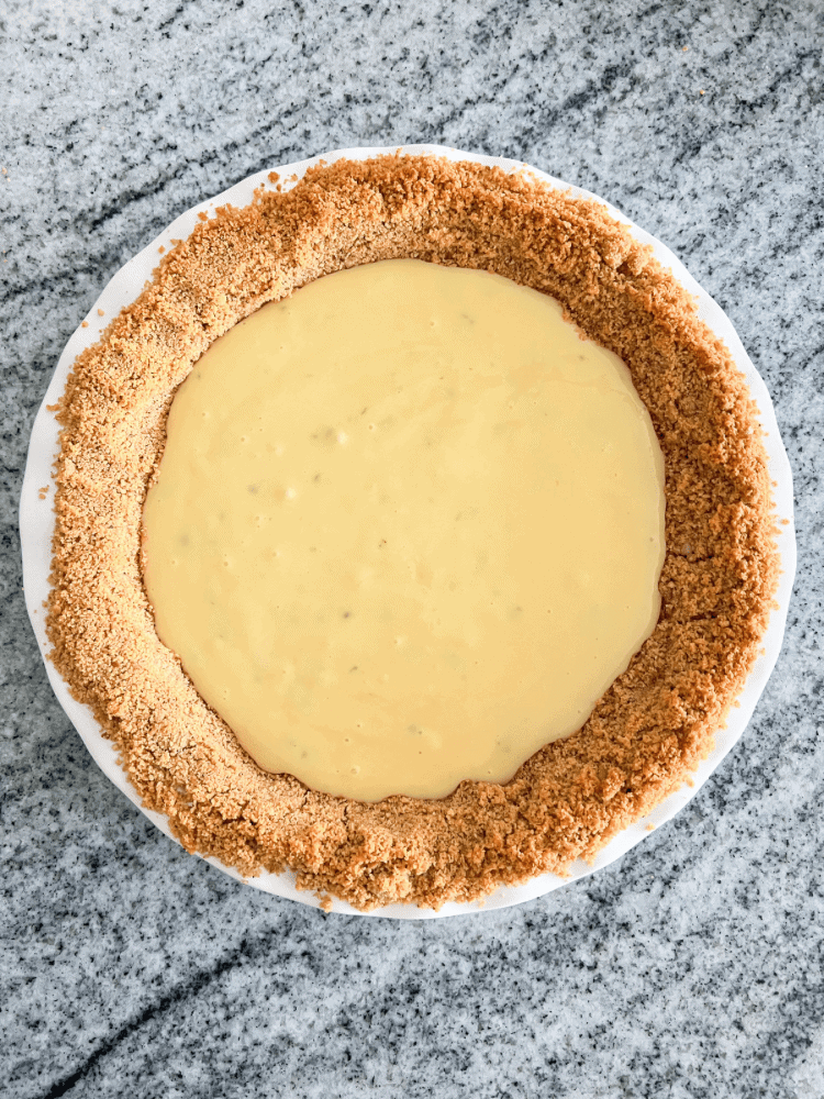 Pouring Key Lime Pie into Crust