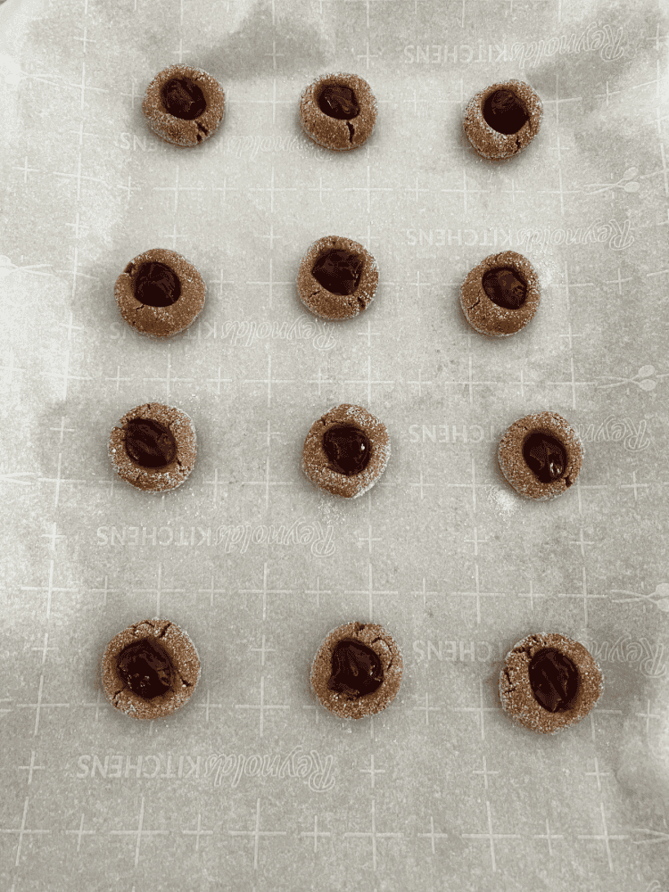 After Filling Cookies With Raspberry Jelly