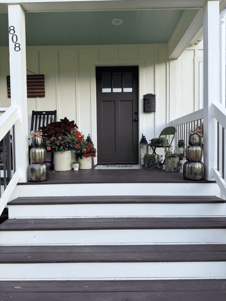 Finished DIY Dollar Tree Pumpkin Topiaries on Fall Front Porch